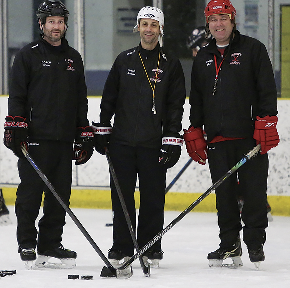 Coaches Drew Tierney, Andrew Schlie and Jon Grzbek