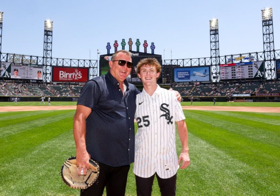 Jim and Landon Thome share a moment on the field at Rate Field following Landon’s selection by the Chicago White Sox in the first round of the 2026 MLB Draft. 
<br><i>Photo courtesy of the Chicago White Sox</i>